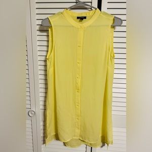Like a new, beautiful light yellow tunic, worn once. You will love it!